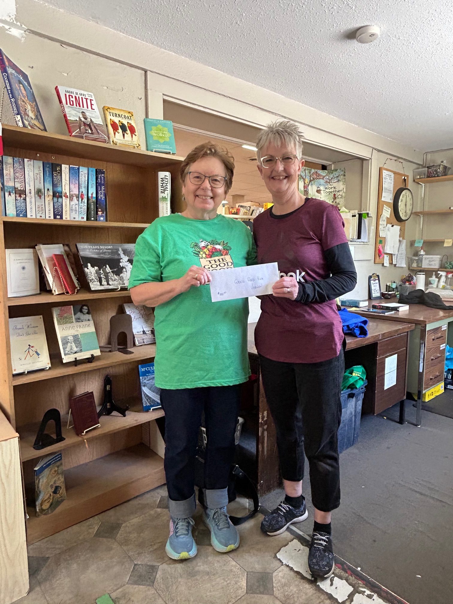 Alpine Book Warehouse donates to Good Food Box
